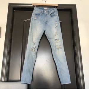Levi & Strauss Co 721 light wash distressed high rise skinny Jean